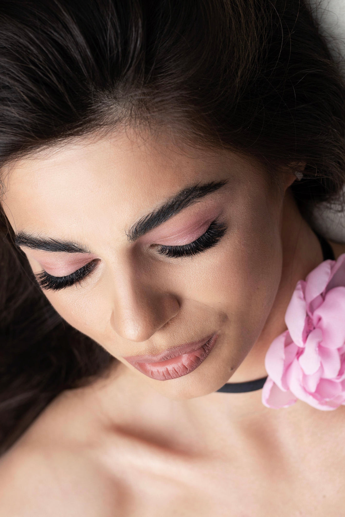 Mega volume eyelashes showing a model face