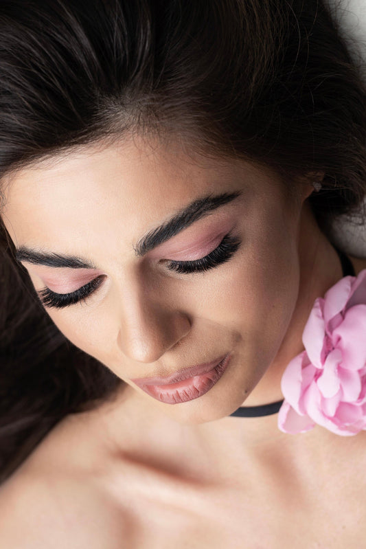 Mega volume eyelashes showing a model face