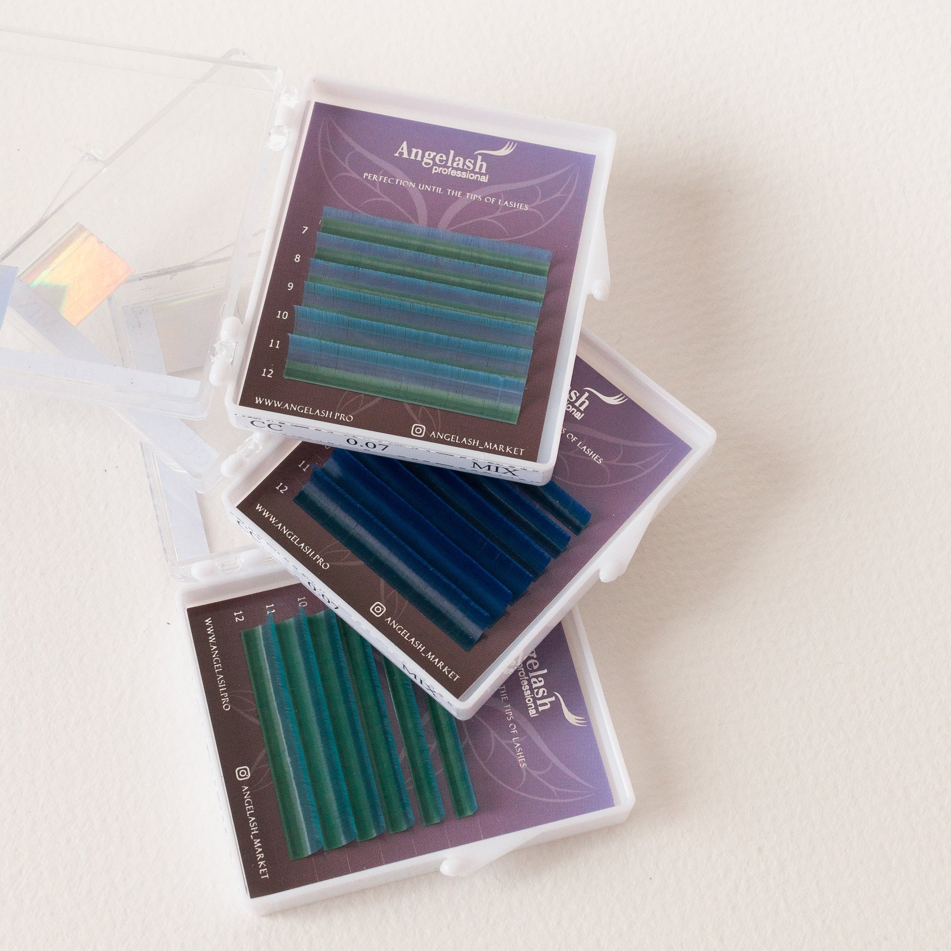 Angelash colored lash trays with green and blue extensions