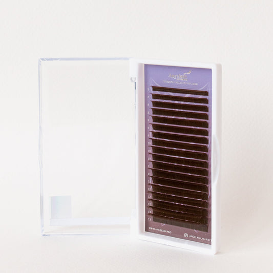 Angelash_eyelash_extensions_tray_displayed_inside_open_clear_case_on_light_background