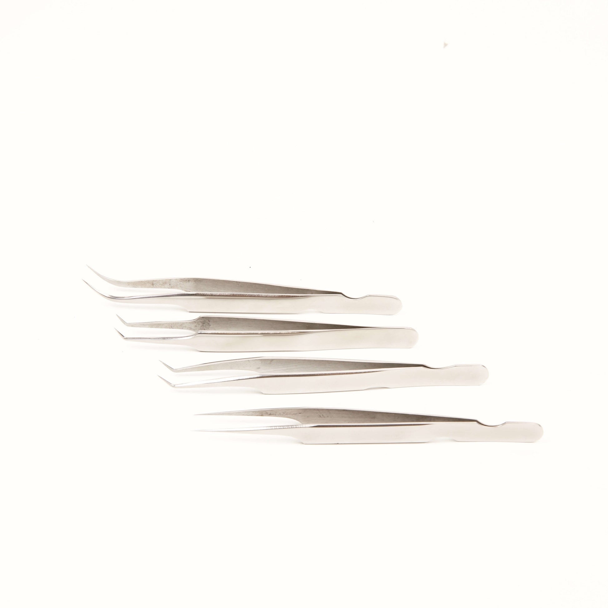 Angelash_silver_tweezers_set_on_white_background