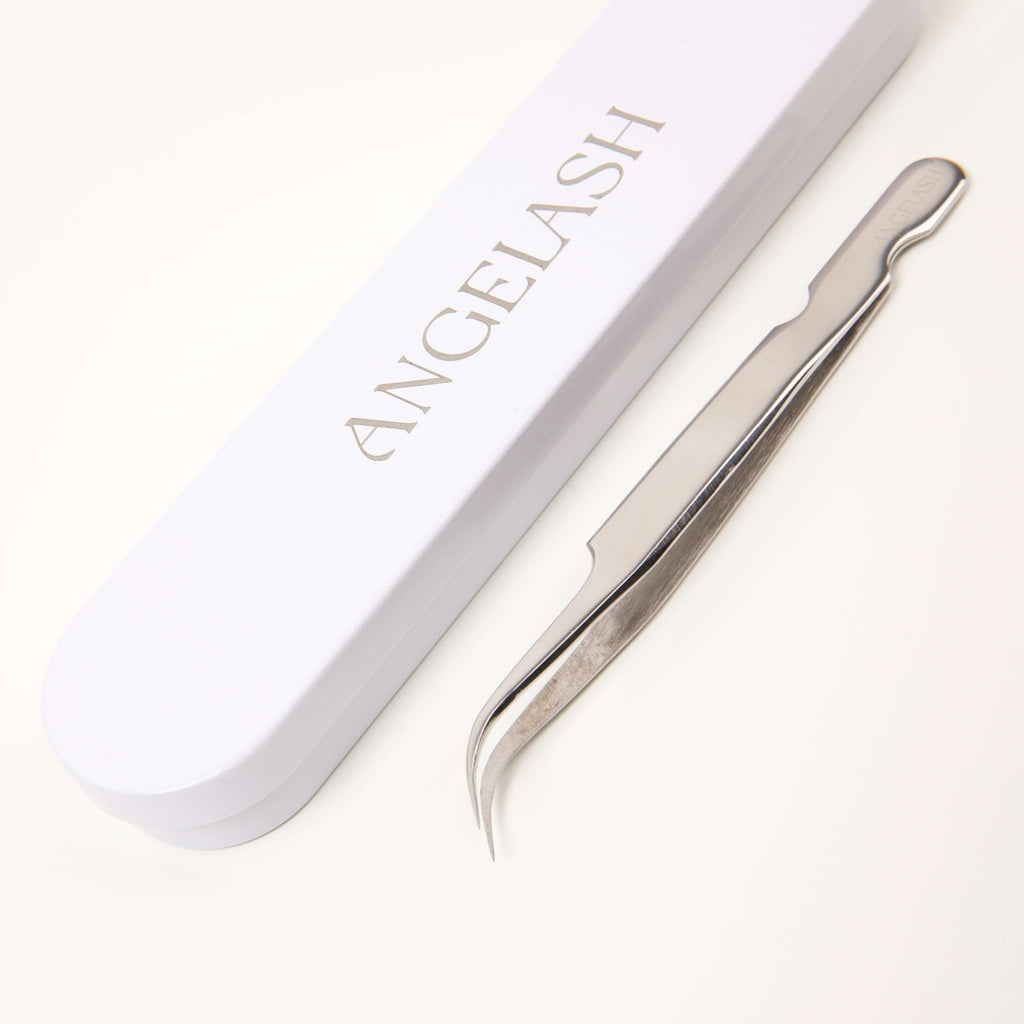 Curved isolation tweezers for separating natural lashes