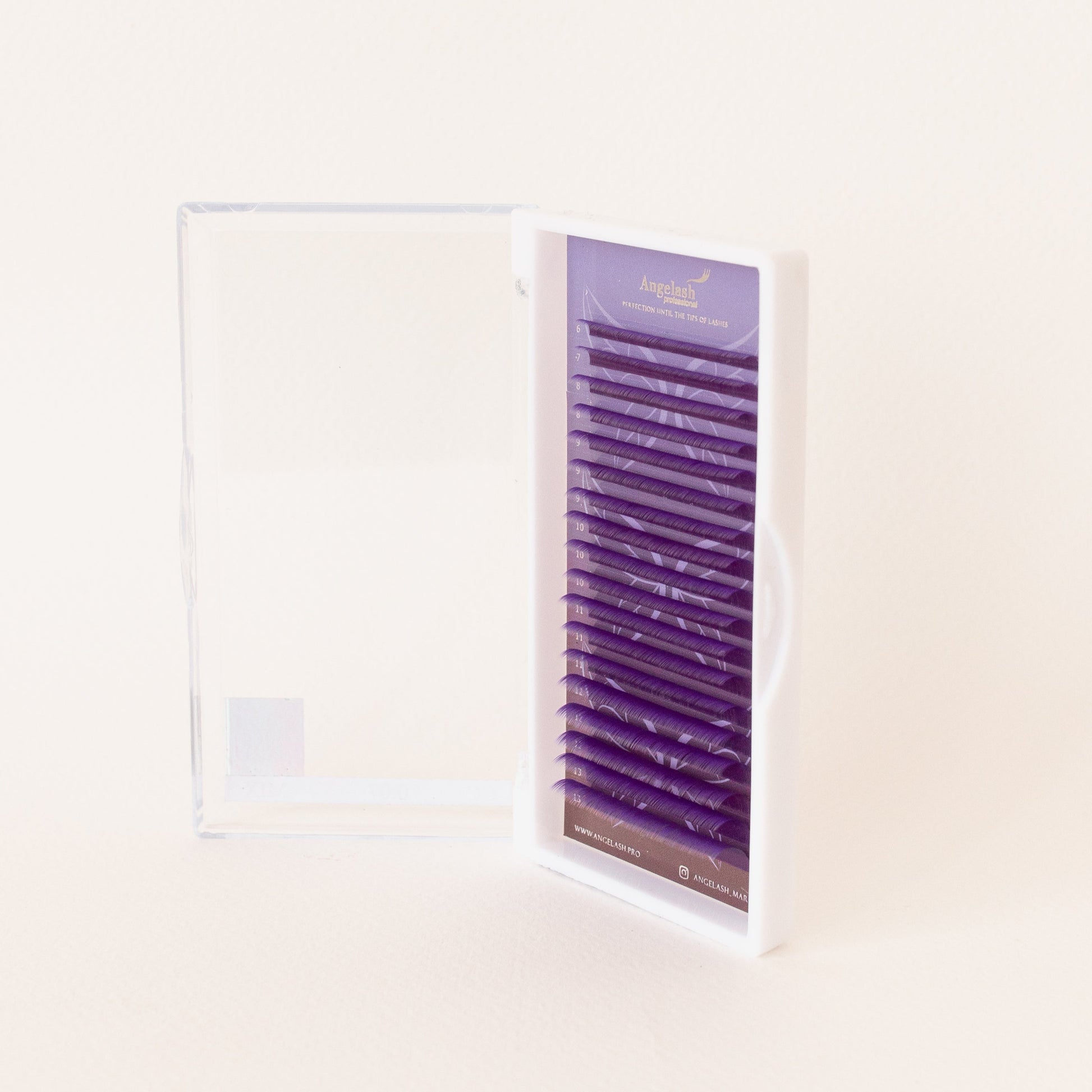 Purple_colored_eyelash_extensions_in_clear_box